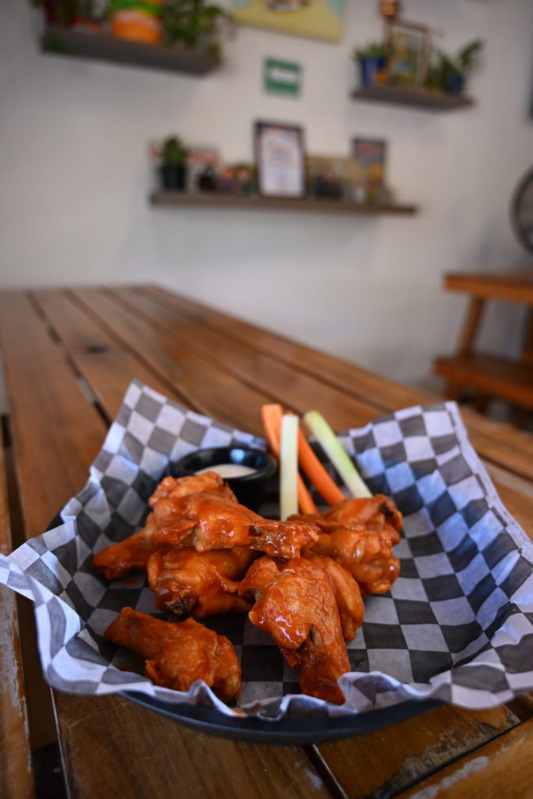 Buffalo wings with carrots, celery and a dipping sauce